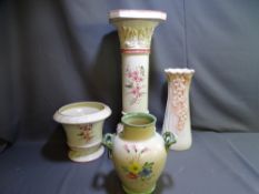 A PORCELAIN PEDESTAL JARDINIERE, a matching plant pot and similar items