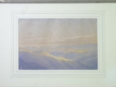 WATERCOLOUR - rolling mountains scene with sunlight appearing intermittently, signed, 24 x 37cms