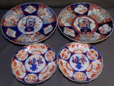 TWO IMARI CHARGERS, along with two similar plates