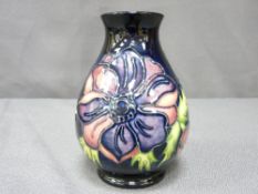 A MOORCROFT 'ANEMONE' BULBOUS VASE, 14cms high