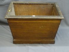AN ANTIQUE OAK PLANTER - Sarcophagus shaped with carved rail detail and carved panel to the front