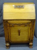A CIRCA 1920's CARVED FRONT BUREAU