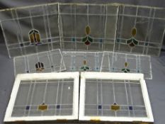 A QUANTITY OF STAINED GLASS WINDOW PANELS various measurements