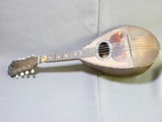 A VINTAGE MANDOLIN with mother of pearl inlay and a polished wooden brass dialled barometer along