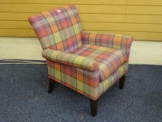 A JOHN LEWIS MODERN EASY CHAIR in tartan type upholstery