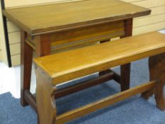 SIDE TABLE with 'Arts and Crafts' carving to the surround on d stretcher, 86cms height, 107cms