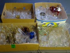 A LARGE COLLECTION OF HEAVY GLASSWARE AND DRINKING GLASSES