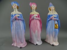 THREE CROWN STAFFORDSHIRE PORCELAIN FIGURINES in medieval dress, 17cm heights (restorations)