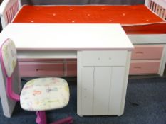 CHILD'S BED WITH PULL-OUT UNDERBED, six drawer storage unit, a white melamine desk and 'Woof Woof'