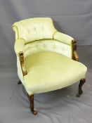 LIGHT GREEN BUTTON BACK UPHOLSTERED TUB CHAIR on shaped front supports with castors