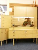 RETRO BEDROOM SUITE comprising two door wardrobe, slim chest of drawers, bedside cabinet and a