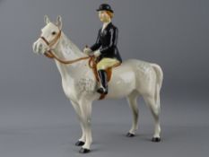 BESWICK MODEL OF A HORSE & RIDER, 21cms height, 21cms length