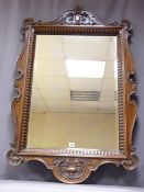 GILLOWS STAMPED OAK FRAMED MIRROR, 118 x 79cms, carved outer details and rib pattern surrounding a