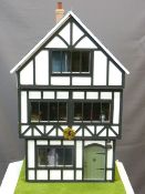 THE TUDOR HOUSE - a three storey building under a slate roof, fully furnished in period style,