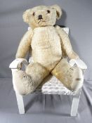 VINTAGE MERRYTHOUGHT GOLDEN MOHAIR TEDDY BEAR with original label, circa 1960, fully jointed,