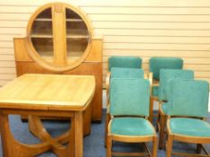 ART DECO DINING SUITE comprising sideboard with circular glazed doors, draw leaf table and set of