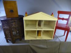 CARVED EASTERN CIRCULAR OCCASIONAL TABLE, a painted child's chair, a dolls house and a vintage set