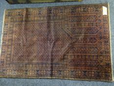 OLD BALUCHI RUG - deep red and blue ground and multi-bordered, 136 x 92cms