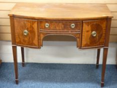 REGENCY STYLE, COMPACT BOW FRONTED SIDEBOARD on spade feet and tapered supports, 86cms height,