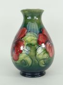 MOORCROFT POTTERY BALUSTER TYPE VASE decorated with tube line decoration of Hibiscus, Queen Mary