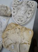 VICTORIAN PLASTER MAQUETTE of a heraldic shield with a goat's head, together with a plaque of a