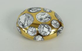 FORMASETTI OF MILAN LUSTRE PEBBLE SHAPE PAPERWEIGHT decorated with cameos of Roman Emperors, 9cms