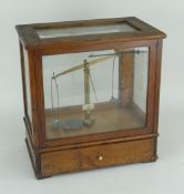 VINTAGE OERTLING OF LONDON CASED CHEMIST'S SCALES with bowl and weights in base drawer