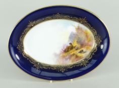 ROYAL WORCESTER PORCELAIN OVAL DISH having cobalt blue border and painted interior with a group of