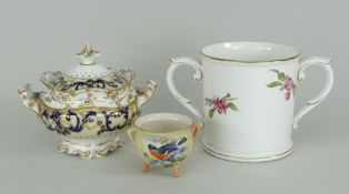 ROYAL WORCESTER PORCELAIN LOVING CUP having scroll handles with a gilt detail, the body decorated