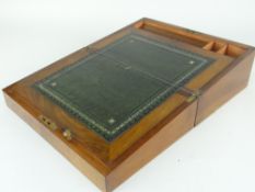 GOOD ANTIQUE FLAME MAHOGANY WRITING BOX with green leather tooled slope and brass escutcheons