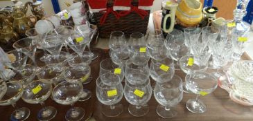 TWO SETS OF BABYCHAM DRINKING GLASSES in two different designs, ETC