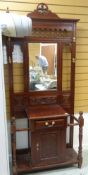 MAHOGANY MIRROR BACK HALL STAND with central drawer and cupboard, 214cms tall x 90cms wide