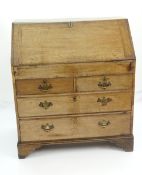 ANTIQUE OAK DROP DOWN BUREAU with two short above two long drawers