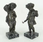 PAIR OF 20TH CENTURY BRONZE SCULPTURES OF CLASSICAL INFANTS, one carrying kindle, the other with