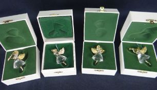 BOXED SWAROVSKI CRYSTAL 'MEMORIES' ANNUAL EDITION CHRISTMAS ANGELS 1996-1999, with certificates (