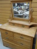 A VINTAGE PINE MIRROR BACKED DRESSING TABLE, with two short above two long, a two drawer mirrored