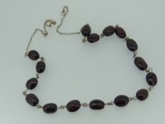 9CT GOLD & GARNET NECKLACE