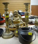LARGE BRASS BUDDHA on wooden stand, with brass candlesticks ETC