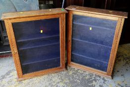 TWO VINTAGE OAK SINGLE GLAZED DOOR HANGING WALL DISPLAY CABINETS, 77 x 61cms