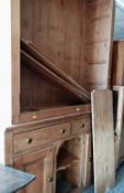 LARGE PINE DRESSER / CUPBOARD with two door glazed shelf top and a two drawer two cupboard base