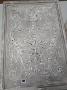 LARGE VICTORIAN PLASTER PLAQUE depicting a green man, and with scroll and scrolled acanthus leaf