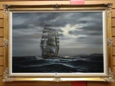 A BEARDSLEY oil on canvas - three masted sailing ship at night, entitled verso 'The Hesperus Tall