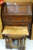 VINTAGE OAK DROP DOWN BUREAU with two drawers on raised turned legs, 102cms tall x 76cms wide,