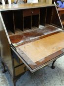 VINTAGE DROP DOWN BUREAU with three drawers on raised ball and claw feet