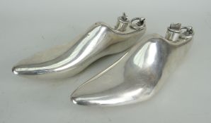 PAIR OF EARLY 20TH CENTURY SILVER PLATE SHOE OR BOOT WARMERS having hot water reservoirs with