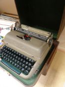 VINTAGE CASED REMINGTON MIRACLE TAB TYPEWRITER, together with a vintage portable Decker wind-up