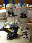 TWO COW CREAMERS and a Staffordshire model of Wesley Spurgeon, and three fairings