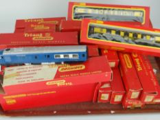 TRAY OF MAINLY BOXED TRI-ANG RAILWAYS OO GAUGE BOXED ROLLING STOCK, carriages and goods vehicles