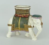 ROYAL WORCESTER PORCELAIN IVORY GLAZED DOMESTIC INDIAN ELEPHANT MODEL with painted and gilded