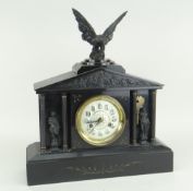 A VICTORIAN BLACK SLATE MANTEL CLOCK of classical architectural form with Emperor figures and